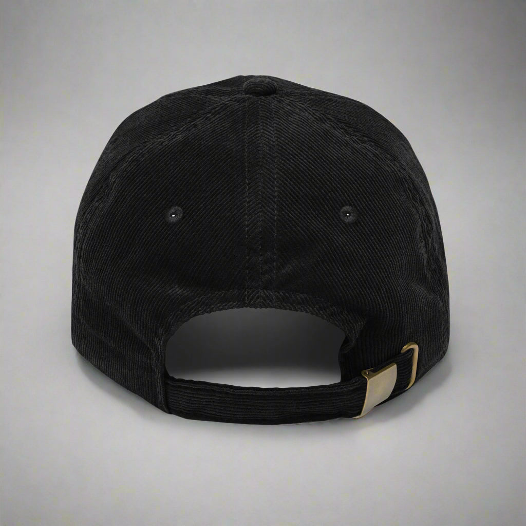 Gorra de pana vintage con texto "Rompe agujeros, no corazones"